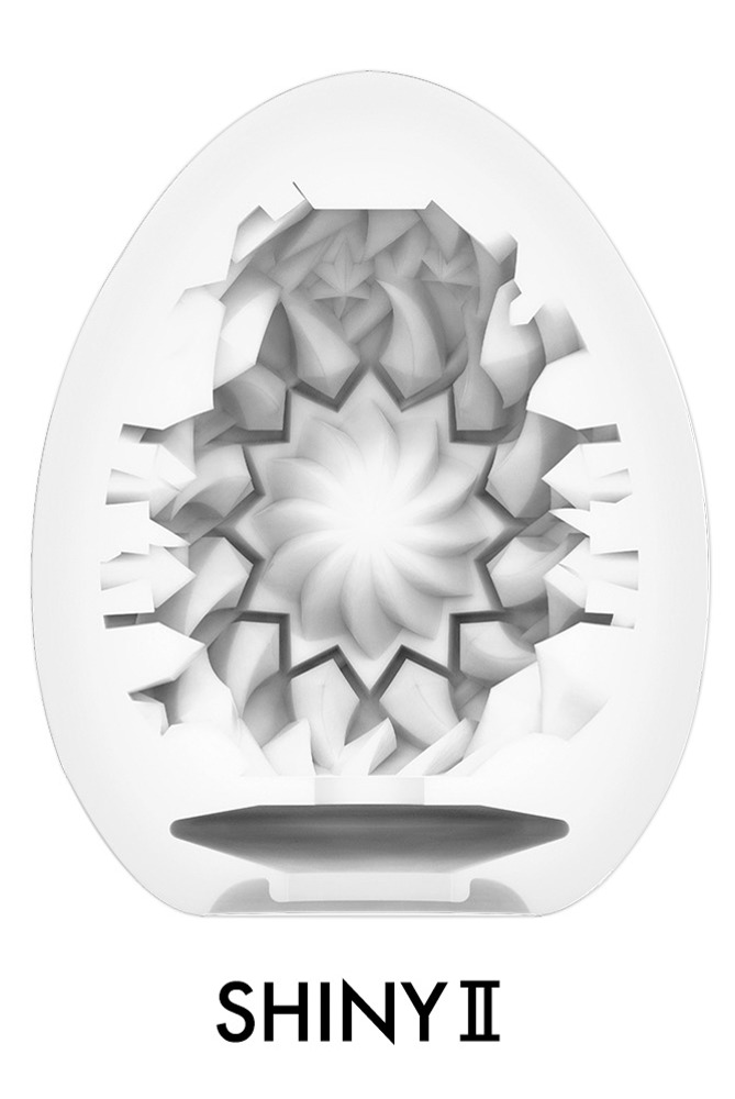 Tenga Egg Stronger «Shiny II» disposable masturbator with stimulating structure (ribs in sun star design)